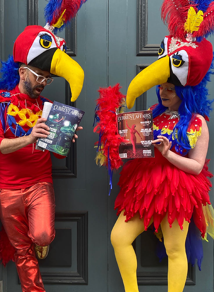 Staffers dressed as giant birds