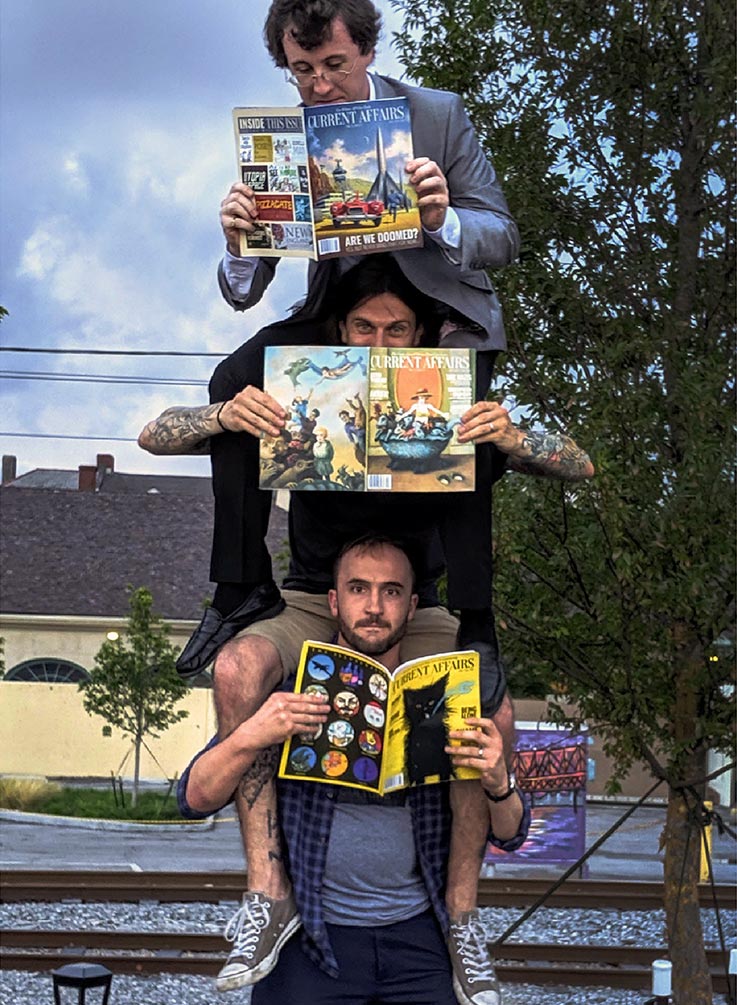 Staffers forming a human pyramid